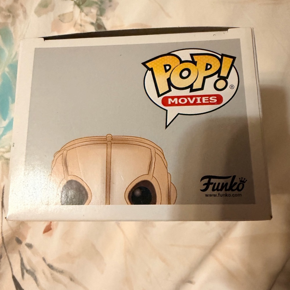 Funko Pop! Movies Us Pluto Figure with Red Outfit - Picture 2 of 3